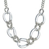 Five Link Crystal Pave Curb Necklace: Clear resin & silver-tone chain necklace with crystal accents.

