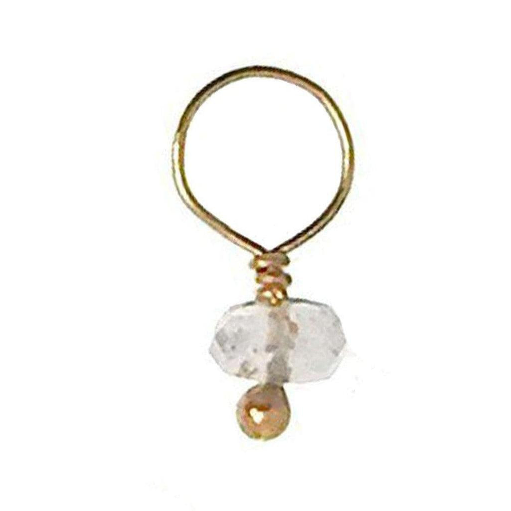 Gold wire wrapped gemstone charm with a clear quartz and gold bead accent.
