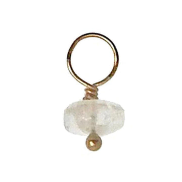 Gold-wrapped gemstone accent with a milky white stone.
