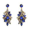 Girls on Film sapphire and crystal statement earrings; gold-tone setting.
