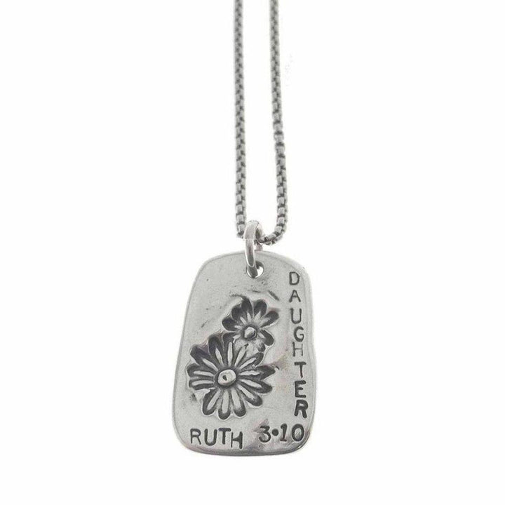 Silver necklace featuring a rectangular pendant with floral etching and "Daughter Ruth 3:10" inscription.

