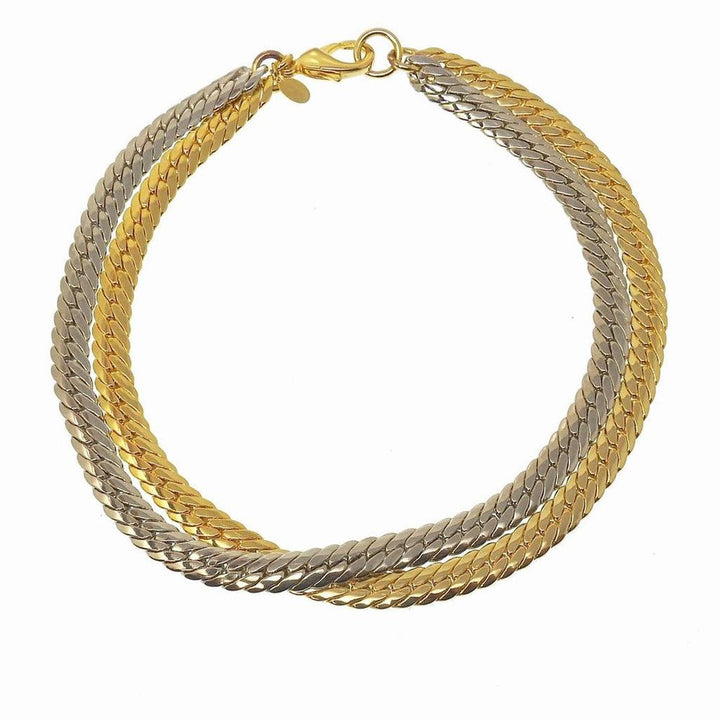 Gold and silver double chain necklace; intertwined design.

