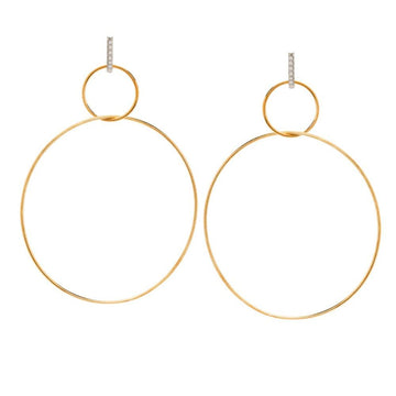 Gold double hoop earrings with diamond accents.
