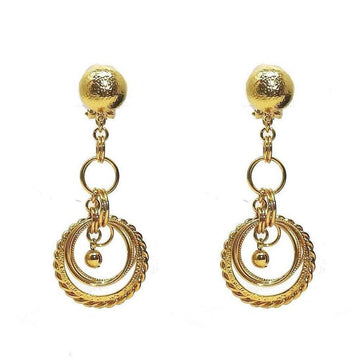 Gold link chandelier clip earrings with textured ball tops and layered circle accents.
