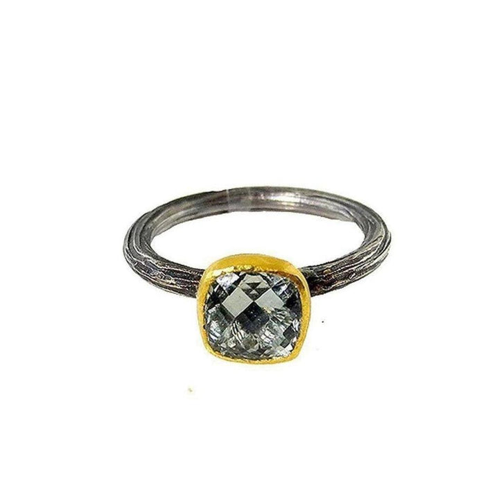 Green Amethyst ring with oxidized silver band and gold bezel setting.
