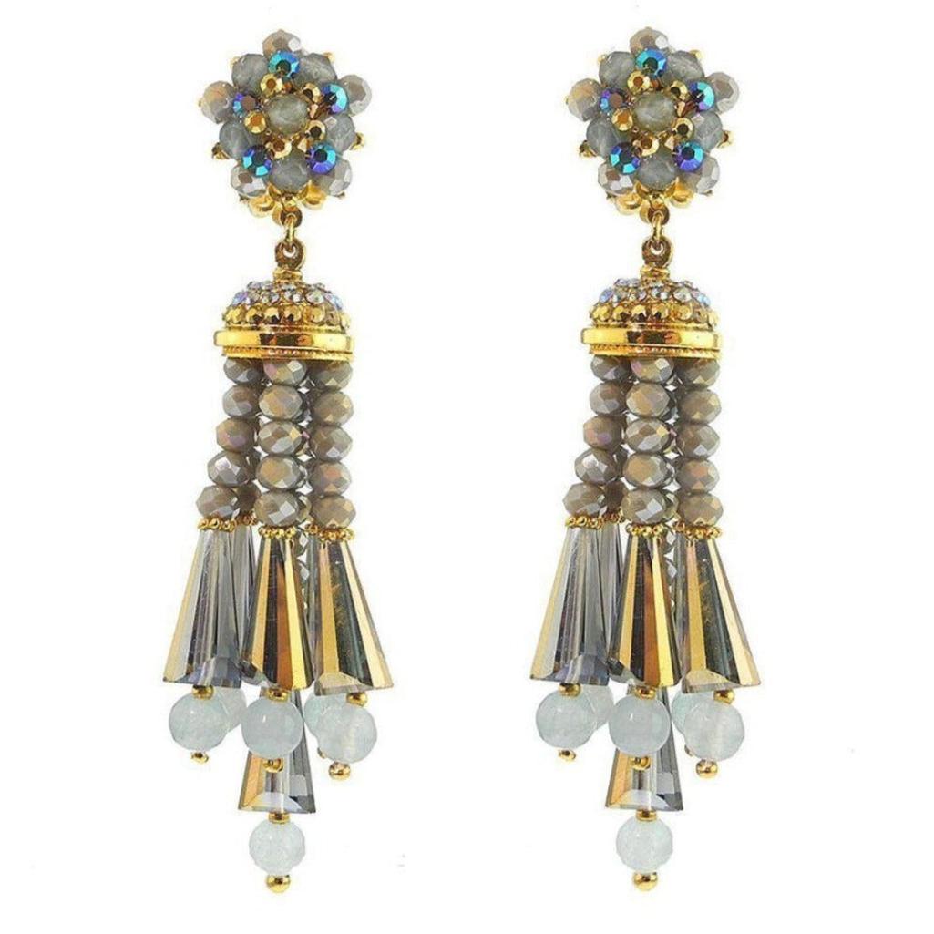 Grey beaded tassel clip earrings with iridescent accents and gold detailing.
