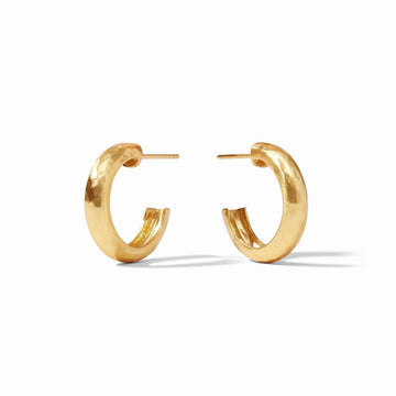 Gold hammered hoop earrings; simple, elegant design.
