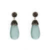 Hematite crystal drop earrings with light blue teardrop stones and black crystal accents.
