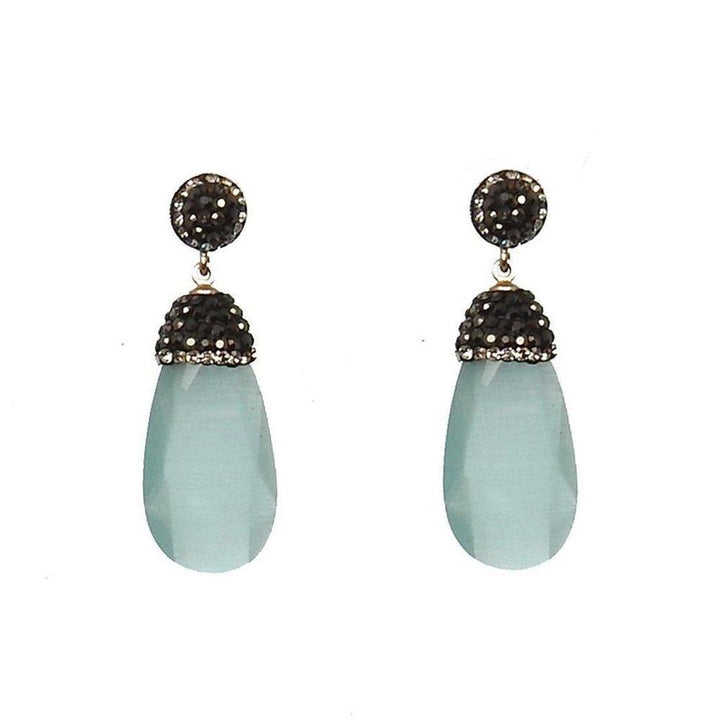 Hematite crystal drop earrings with light blue teardrop stones and black crystal accents.
