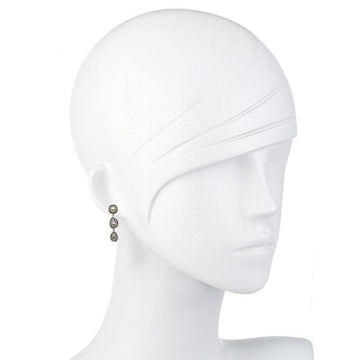 Hematite gemstone drop earrings on a mannequin, showcasing their elegant design.
