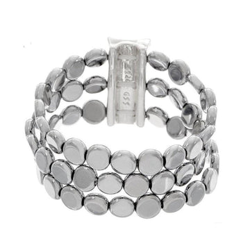 Triple-row hematite stretch bracelet with a silver clasp.
