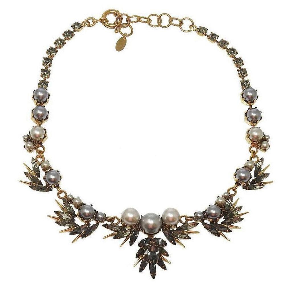 Hogan Pearl Necklace: Elegant gold statement necklace with gray & white pearls and dark crystal accents.
