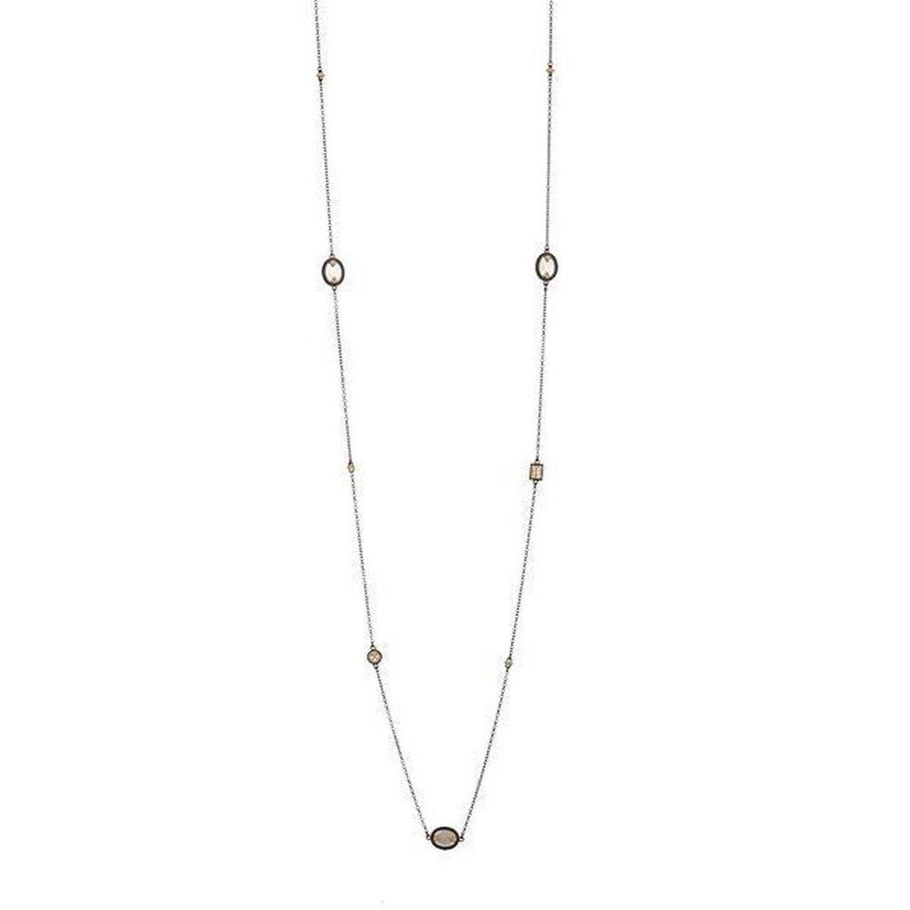 Elegant Imperial Mother of Pearl station necklace featuring oval and square accents.
