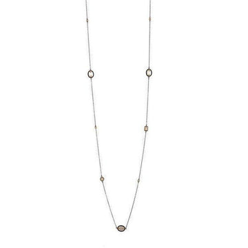 Elegant Imperial Mother of Pearl station necklace featuring oval and square accents.
