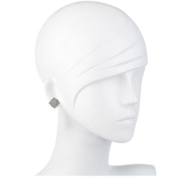Silver Indian coin stud earrings on a mannequin.
