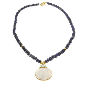 Elegant necklace featuring iolite beads and a moonstone pendant accented with blue topaz.
