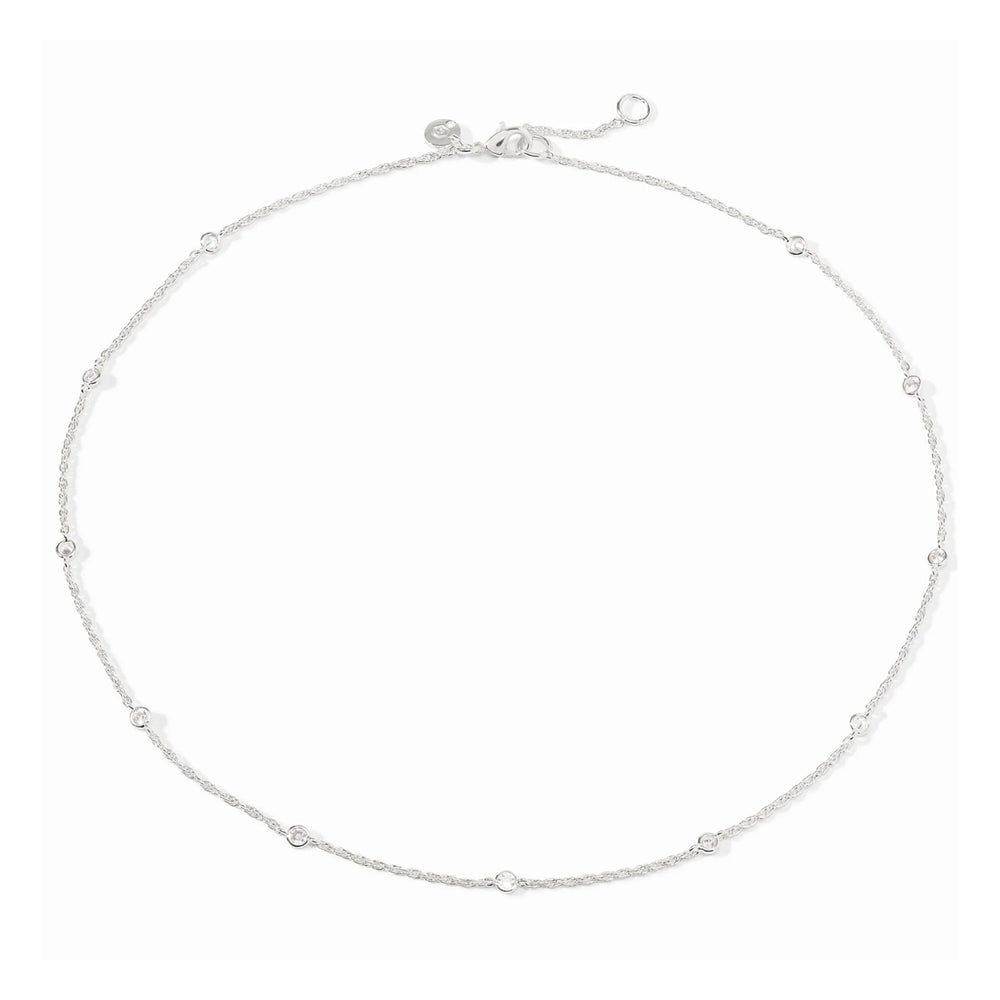 Silver-plated delicate station necklace featuring round bezel-set cubic zirconia crystals on an adjustable chain.