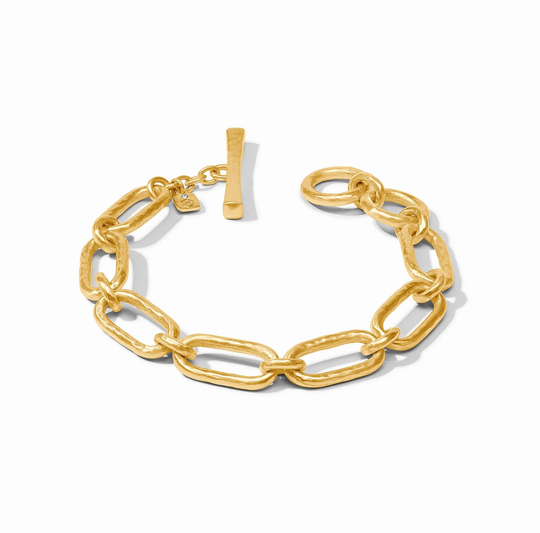 Gold-plated Sahara Demi link bracelet with a textured chain design, toggle clasp, and Julie Vos hallmark charm.