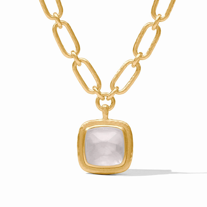 Sahara statement necklace featuring a square gemstone pendant on a 19-inch 24K gold-plated chain link with a toggle closure.