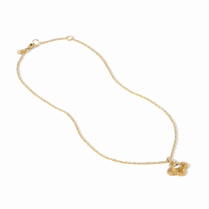 Theodora delicate 24K gold-plated necklace featuring a mother of pearl pendant with a central CZ stone on a slender chain.