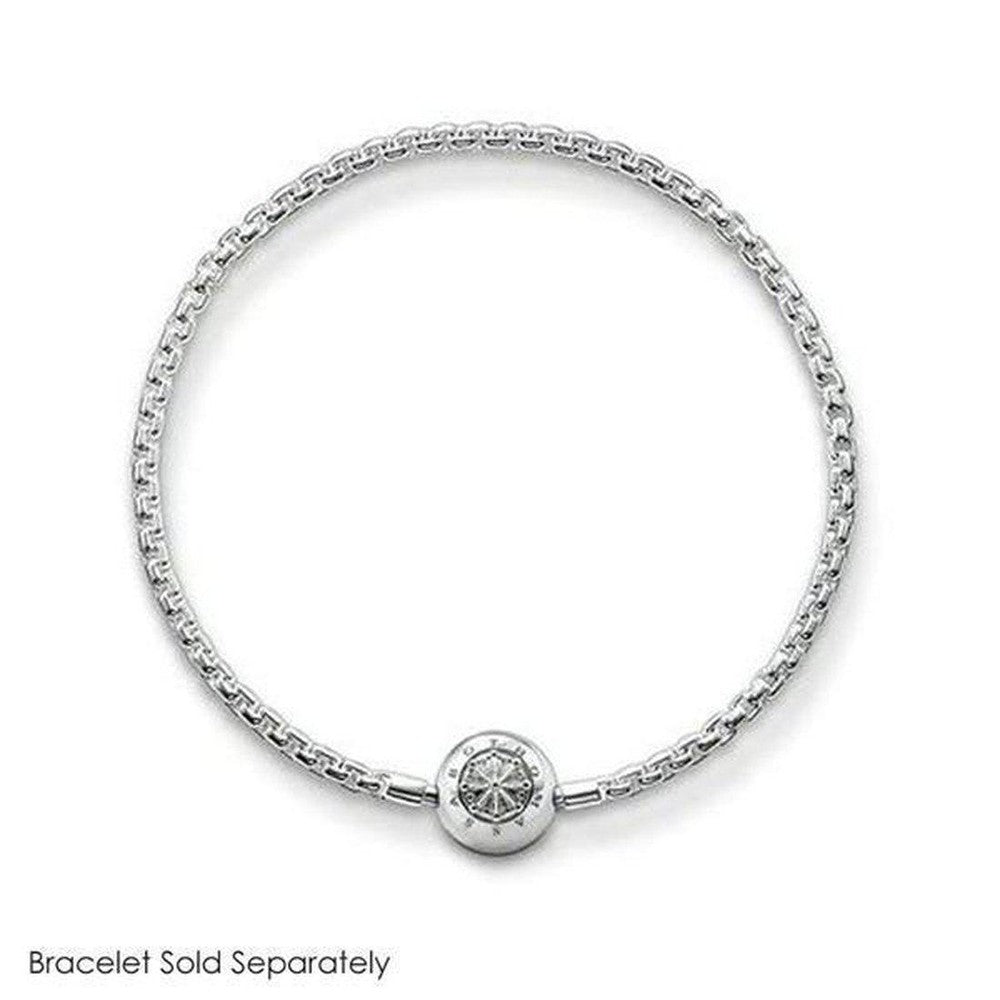 Silver charm featuring an etched circular design, shown on a delicate chain bracelet (bracelet sold separately).
