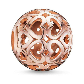 Rose gold Karma Bead Hearts charm; intricate heart design.
