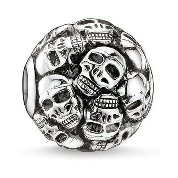 Silver Karma Bead Skulls charm featuring multiple detailed skull designs.
