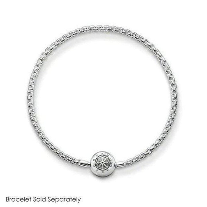 Silver charm with decorative detail, shown on a silver chain bracelet (bracelet sold separately).
