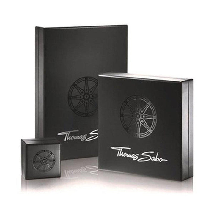 Black jewelry boxes of varying sizes, featuring embossed wheel designs and brand logo.
