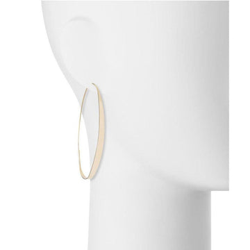 Gold large hoop earrings on a mannequin.
