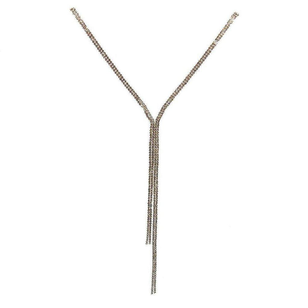 Silver lariat necklace with pave detailing, featuring a long, multi-strand design.
