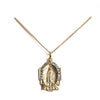 Gold Guadalupe charm necklace with clear cubic zirconia accents.
