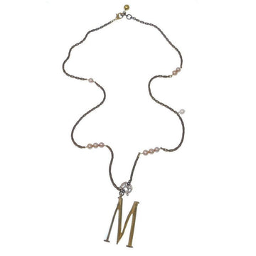 Gold initial M pendant necklace on brown chain with delicate pearls.
