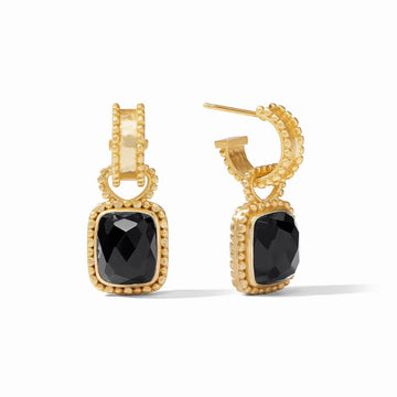 Gold hoop earrings with black gemstone accents.
