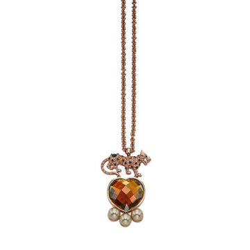 Mawi Leopard necklace: Rose gold chain, jeweled leopard pendant, heart-shaped gemstone, and pearl accents.
