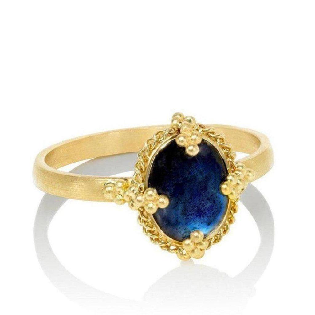 Gold Tanzanite ring with beaded detailing, medium oval gemstone
