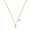 Mini Moon & Star necklace in yellow gold with sparkling accents.
