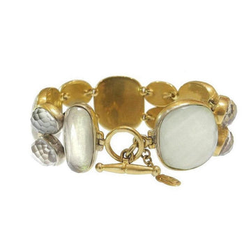 Gold tone bracelet featuring moonstone and quartz gemstones.
