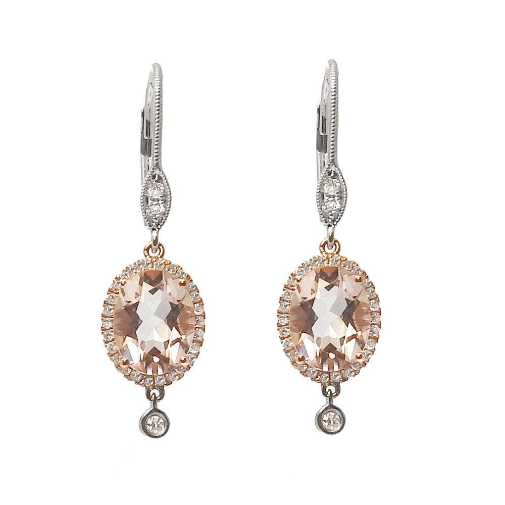 Elegant morganite and diamond earrings: oval morganite center stones, rose gold & white gold, dangling diamond accents.
