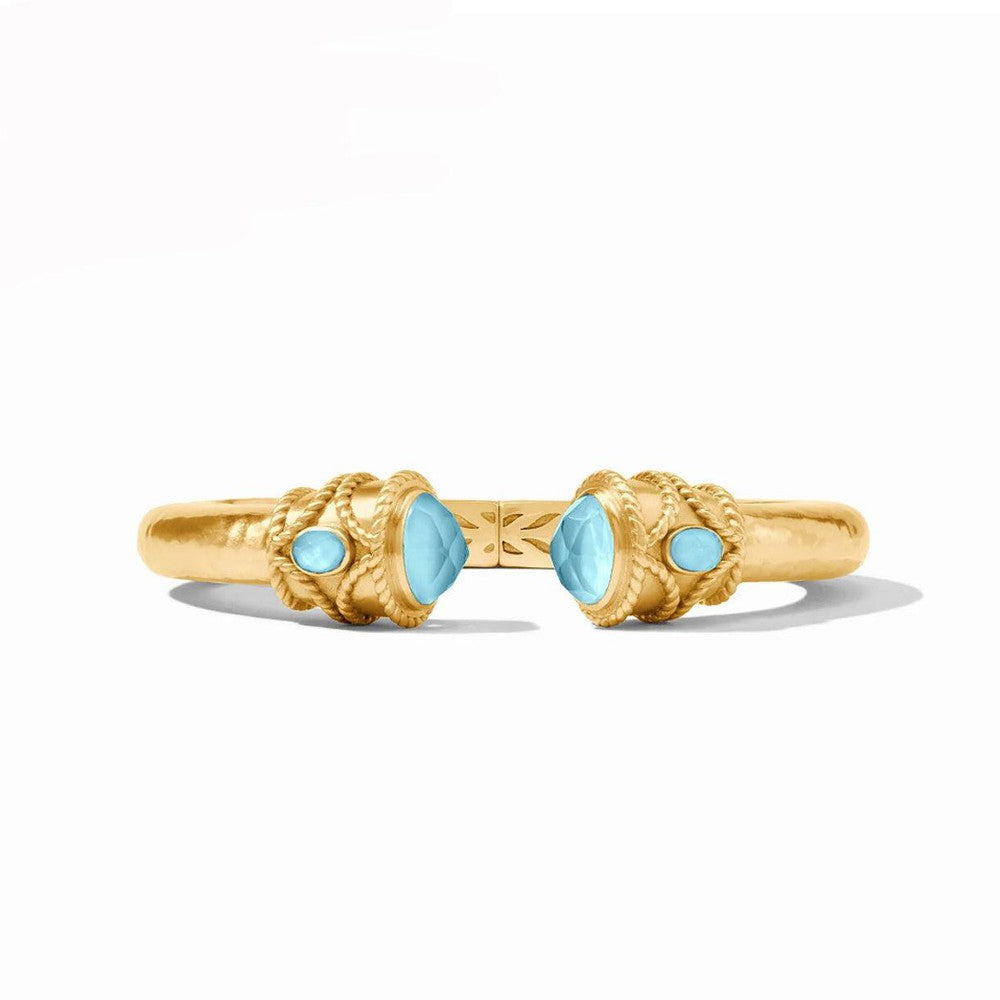 Gold Nassau Demi Hinge Cuff bracelet with light blue gemstones.
