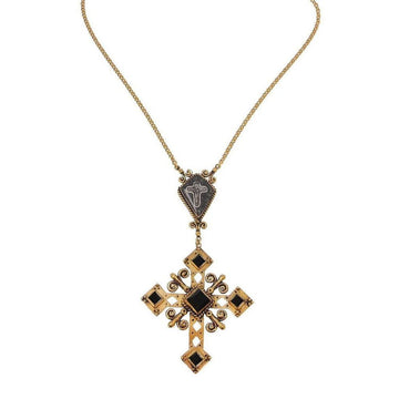 Gold cross necklace with black accents, featuring a detailed pendant and chain.
