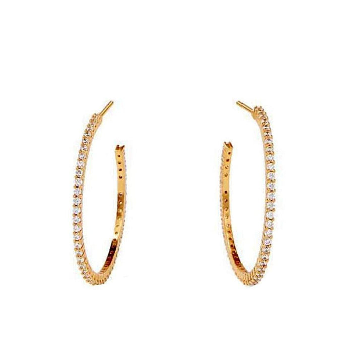 Gold Paris Hoops earrings with sparkling cubic zirconia accents.
