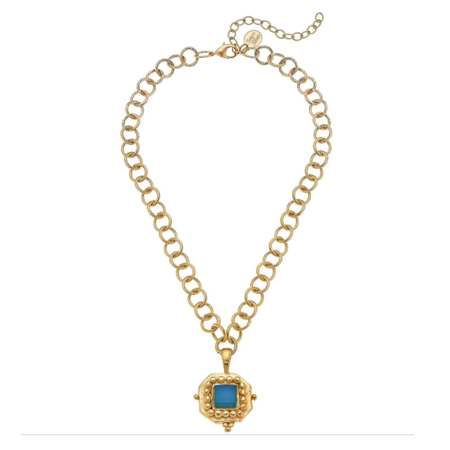 Charlotte pendant featuring an aqua French glass stone on a 24k gold-plated textured link chain with an extender.