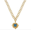 Charlotte pendant featuring a square aqua glass stone on a textured 24k gold-plated link chain.