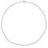 Oxidized sterling silver chain featuring stationed blue topaz gemstones set in 18k gold accents on an 18-inch necklace.