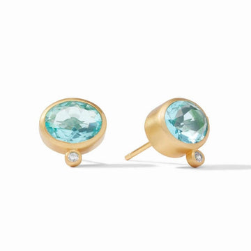 Gold stud earrings featuring oval blue gemstones and small accents.
