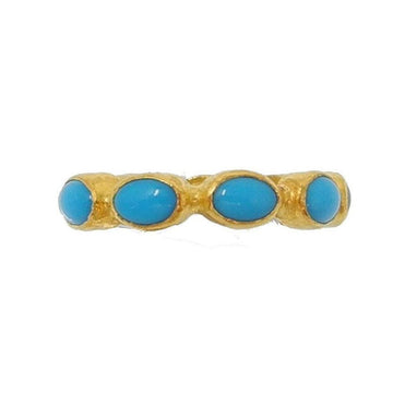 Gold band ring featuring four cabochon turquoise gemstones.
