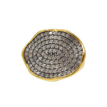Oval-shaped diamond ring, size 6.5, with gold edging.
