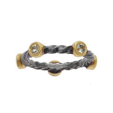 Ara 24k Twisted Diamond Band: Oxidized silver & 24k gold band with bezel-set diamonds.
