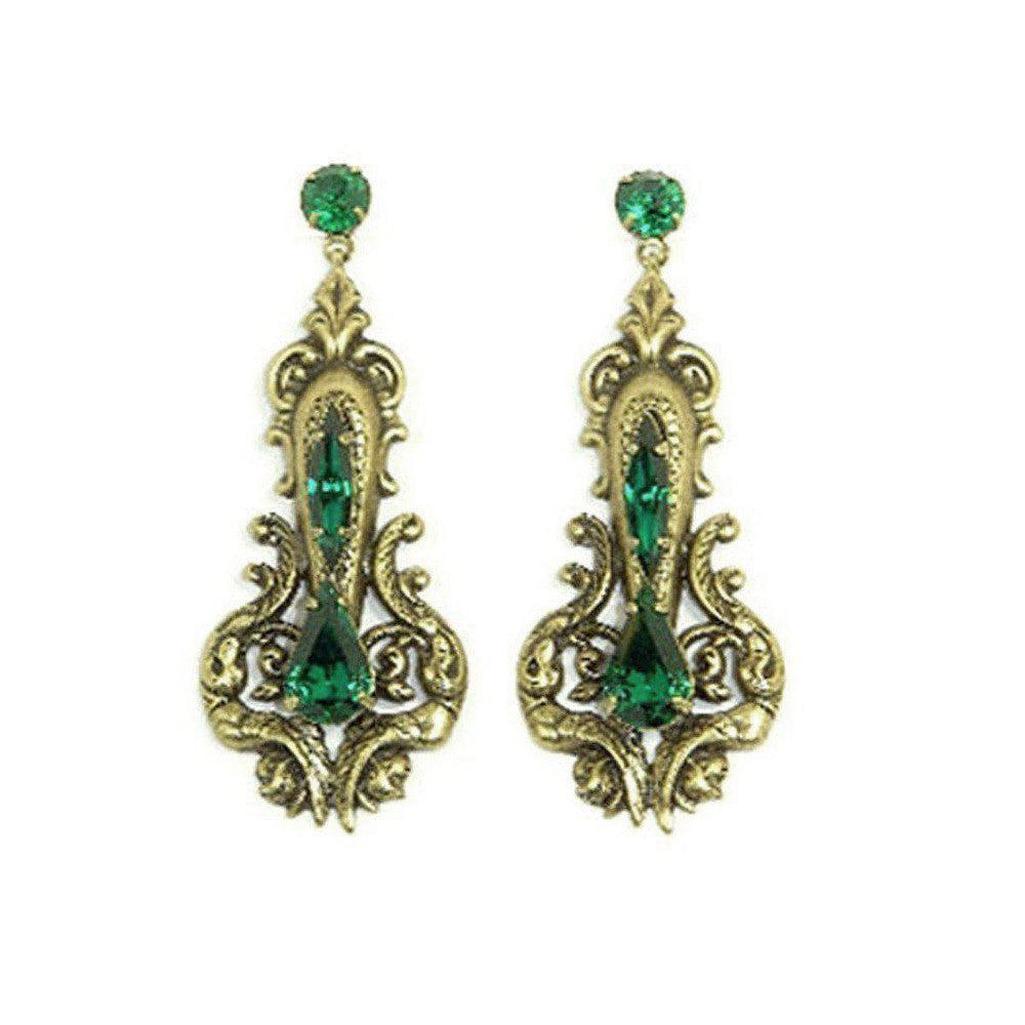 Auden Remy earrings: antique gold filigree, emerald green crystal accents.
